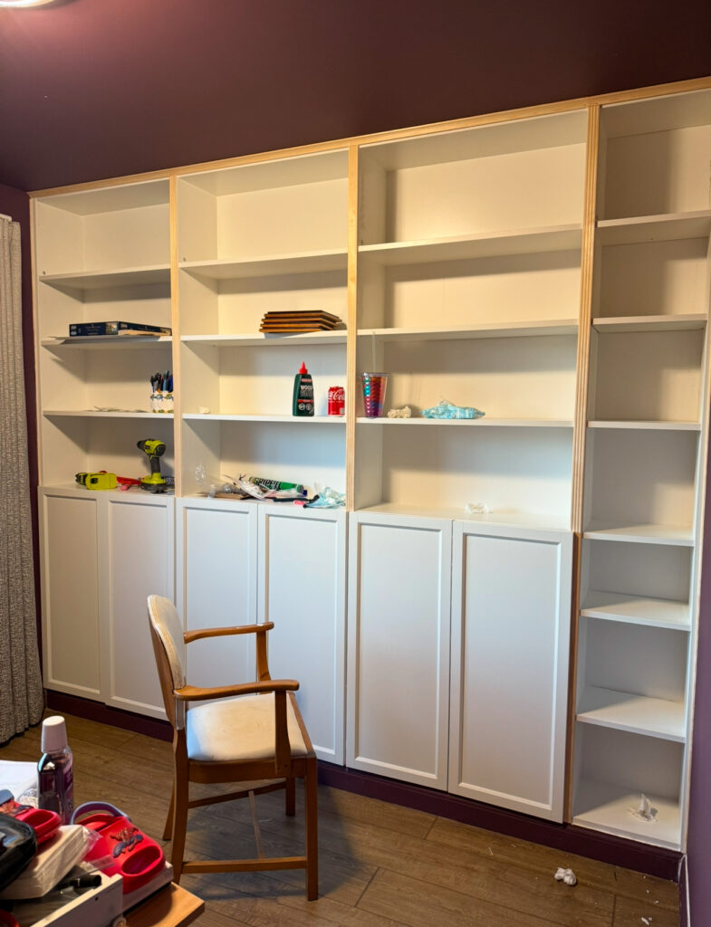 IKEA Billy Bookcases all fitted and trimmed for a built in unit