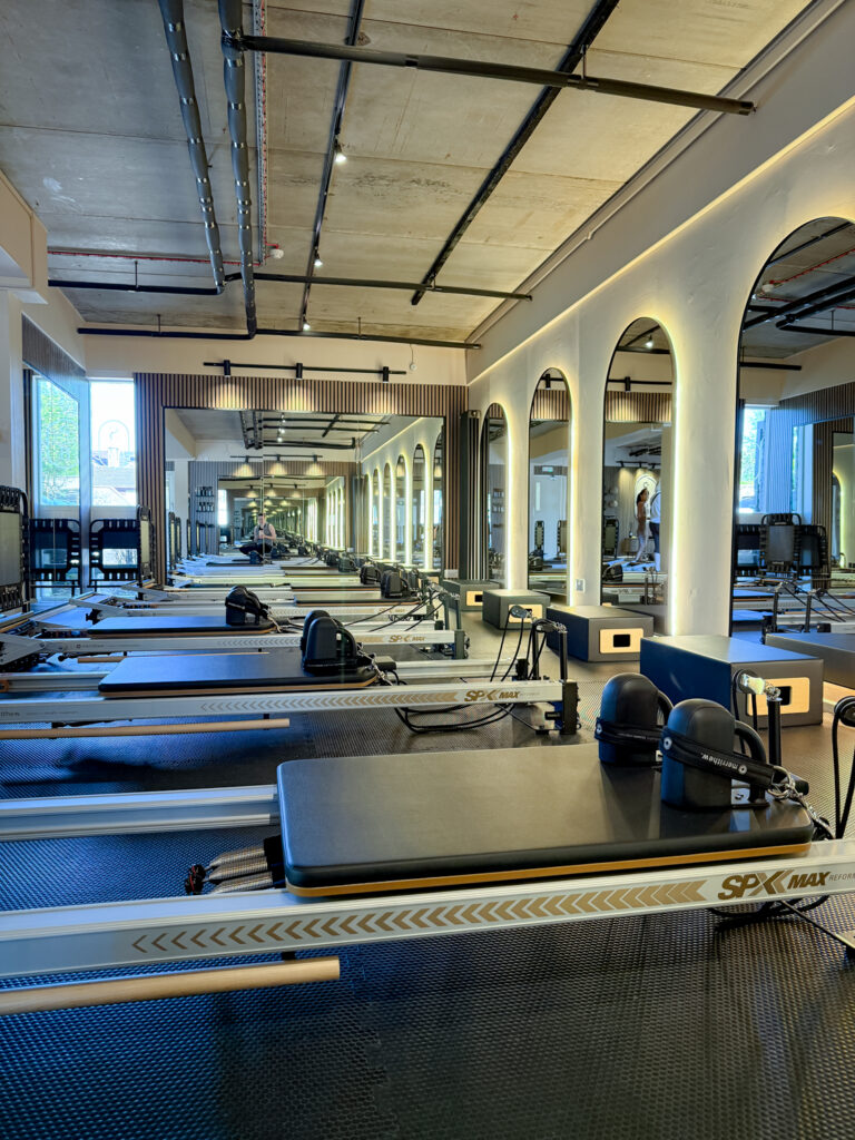 Reformer pilates machine in a bright modern studio
