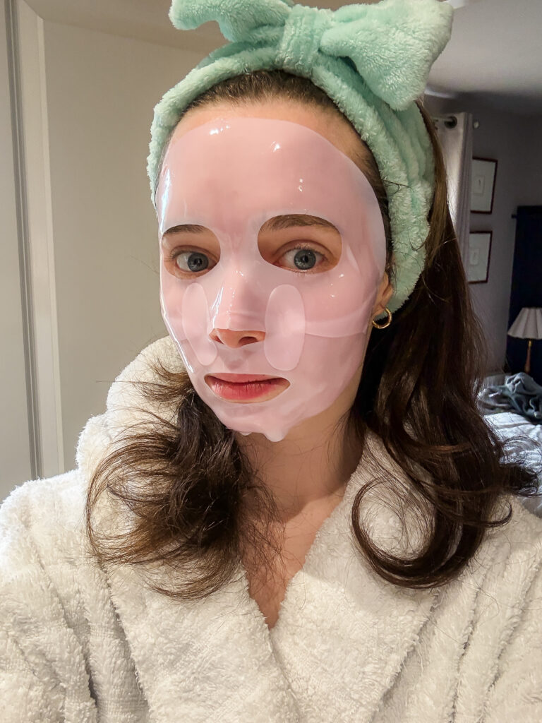 Wearing the viral Medicube PDRN pink collagen gel mask at home during a real-time honest review