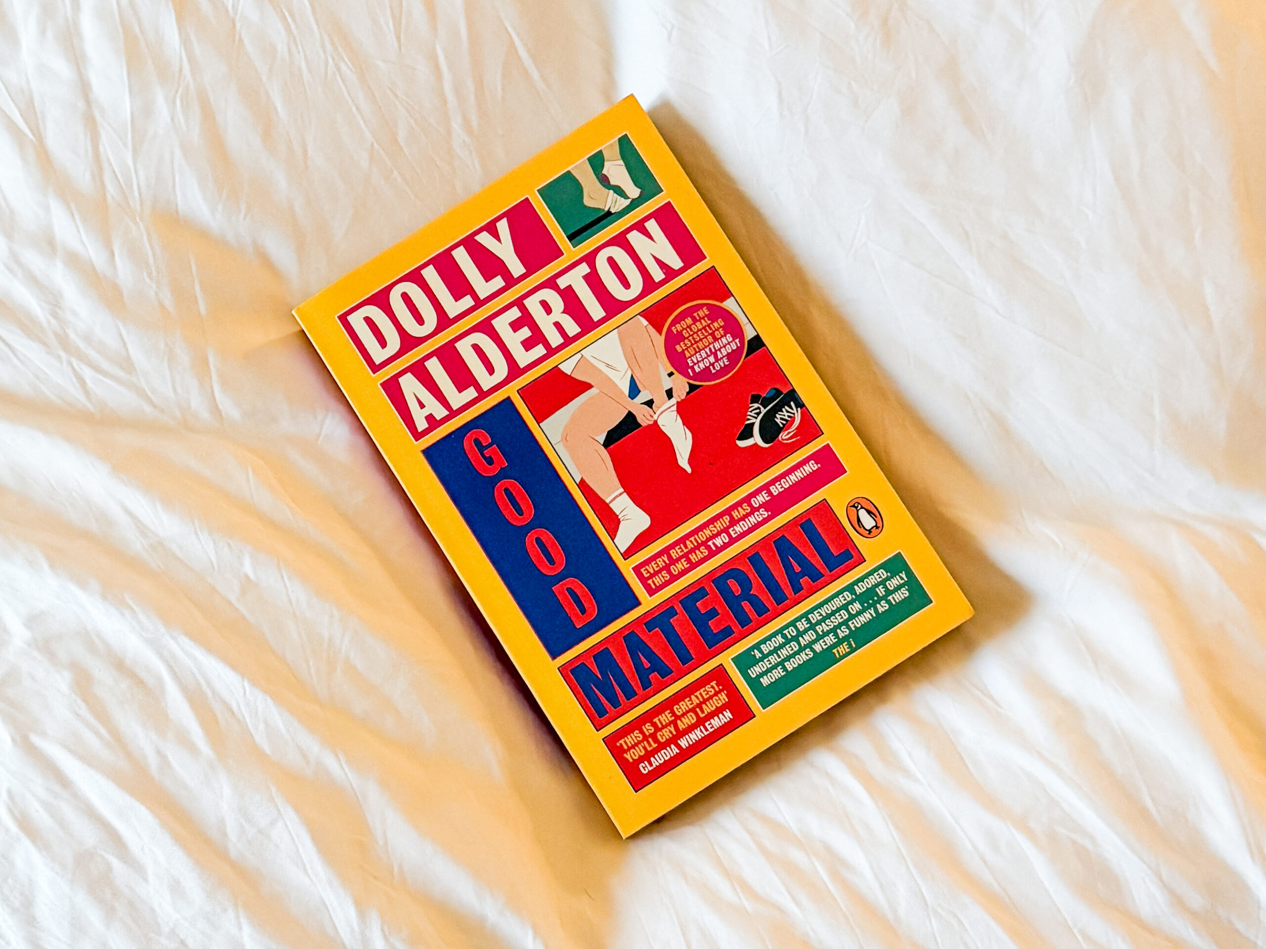 Good Material by Dolly Alderton book on a white linen surface