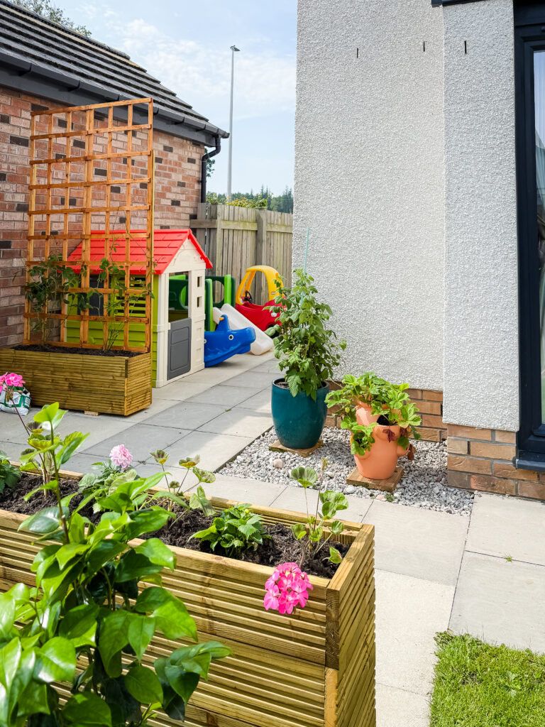 New Build Garden Transformation with DIY planters and trellis
