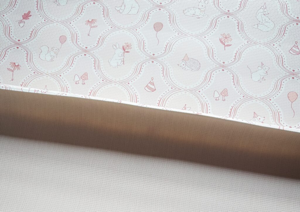 pearl pink whimsical woodland play mat from ruggable showing both reversible sides
