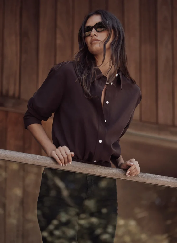 Model wearing the Mint Velvet brown cotton-blend tailored shirt