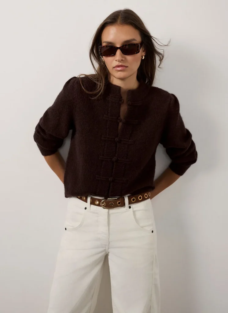 Model wearing the Mint Velvet brown knot-button cardigan